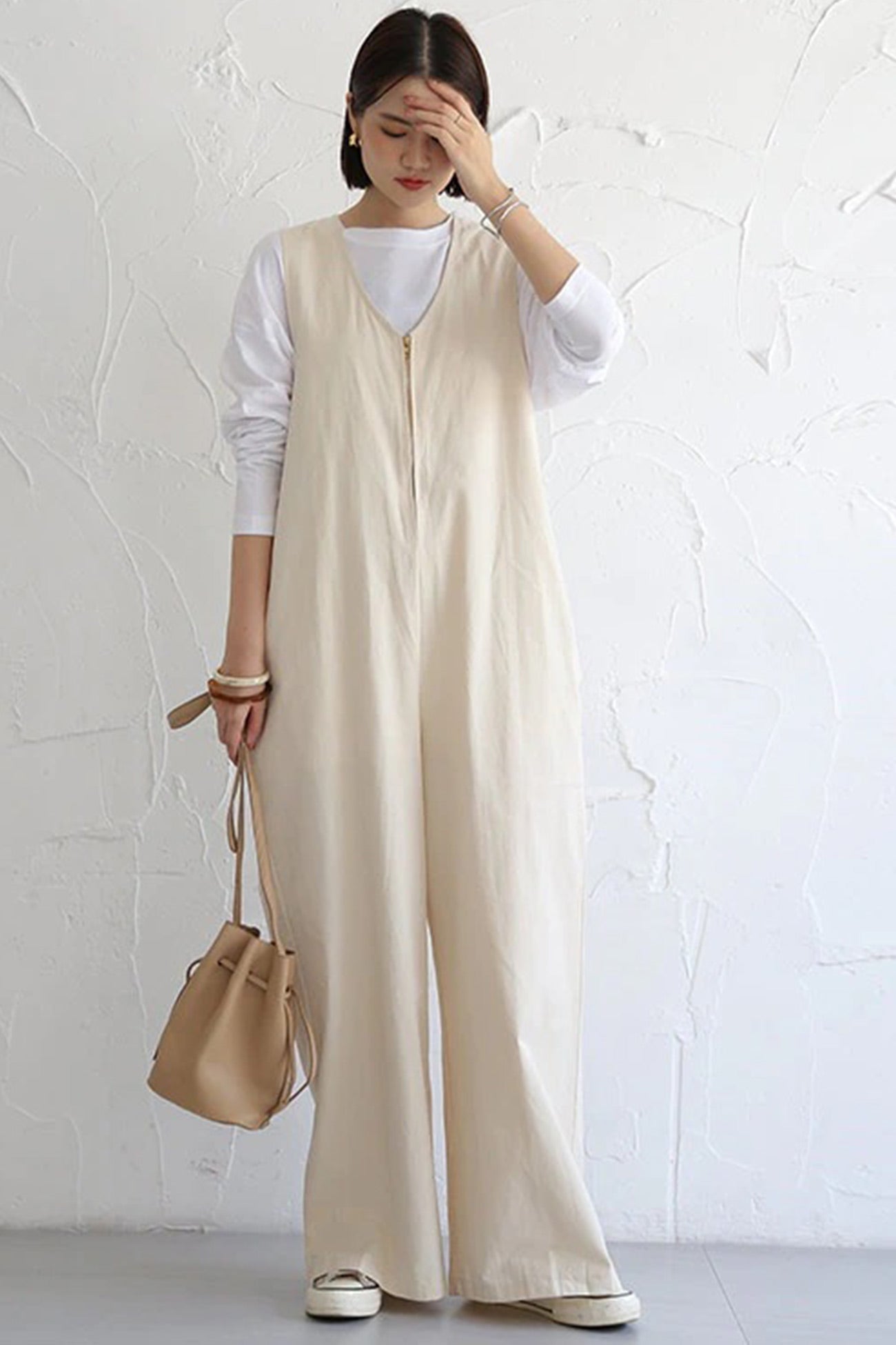 Clara® | Sleeveless wide leg jumpsuits with zip front closure