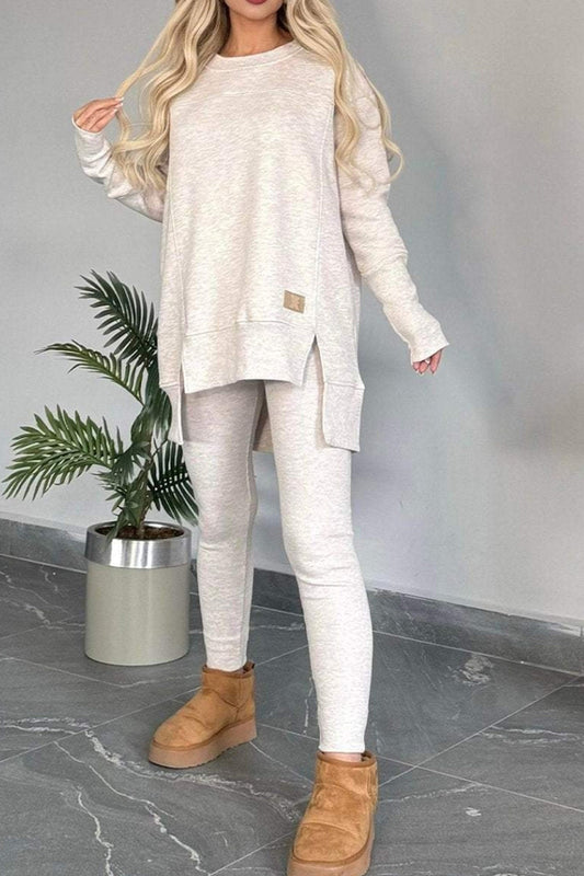Claudia® | Sweatshirt and skinny pants set with a slit and a high low hem