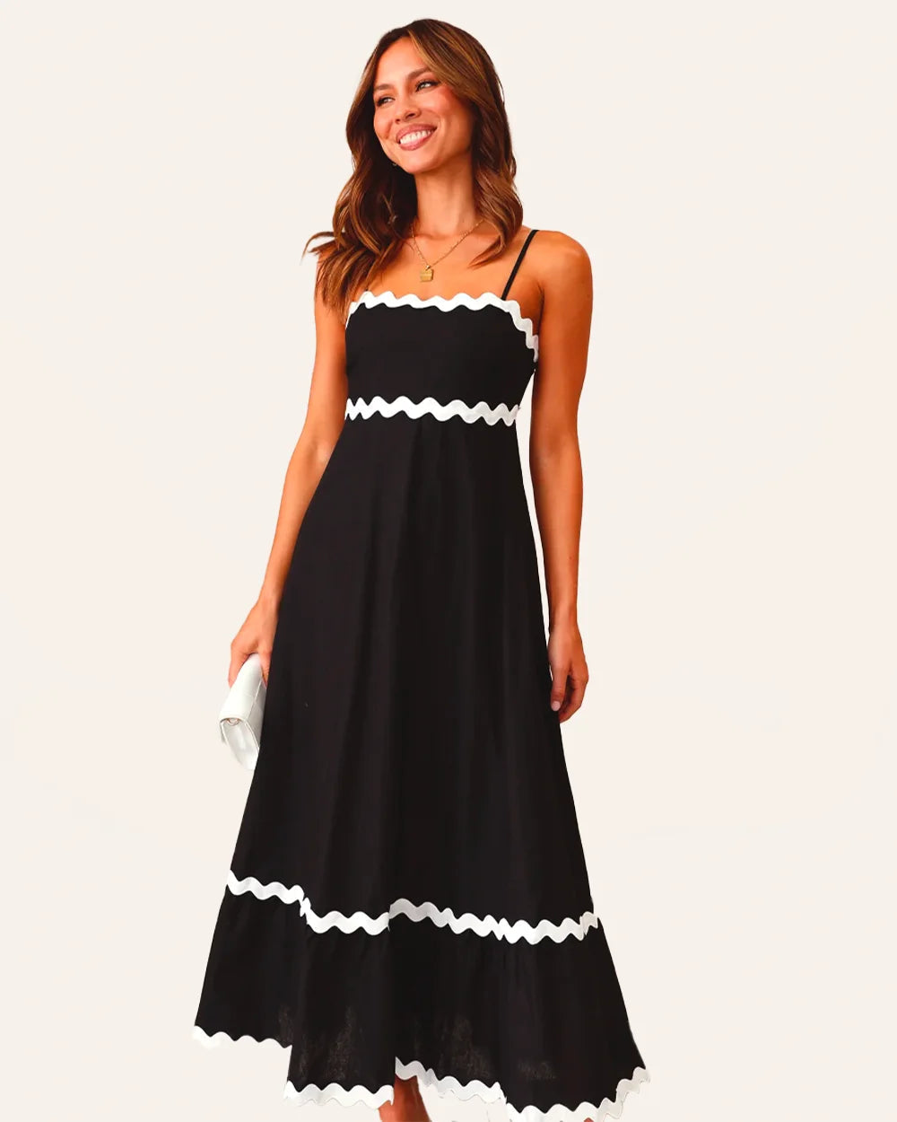 Clara® | In contrast, a long Capri dress