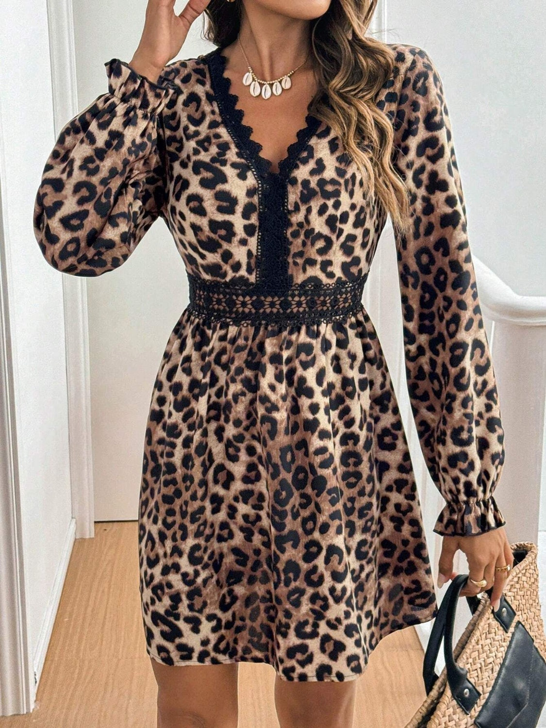 Caridad® | Mini dress with lace detail and leopard flounce sleeves