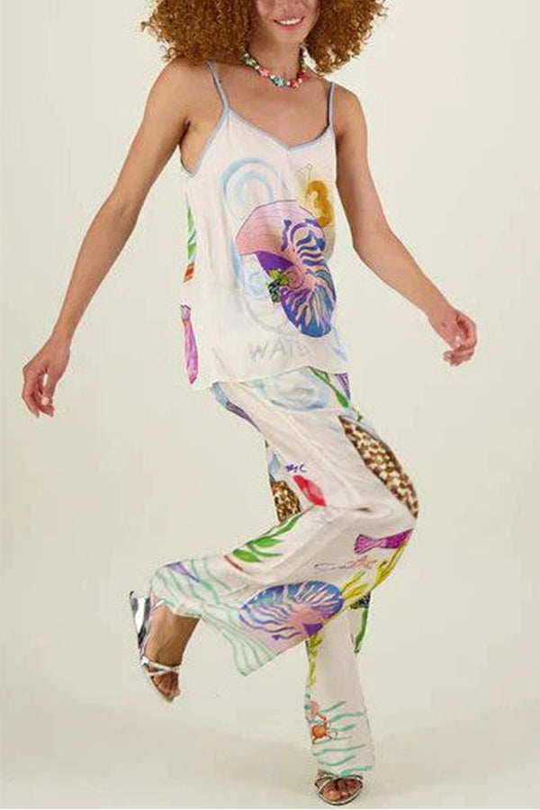 Ana® | Satin pants with a unique print on the back, elastic waist, pockets and wide leg