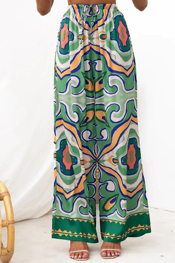 Consuelo® | Satin ethnic abstract print wide leg pants in satin with elastic waistband and pockets