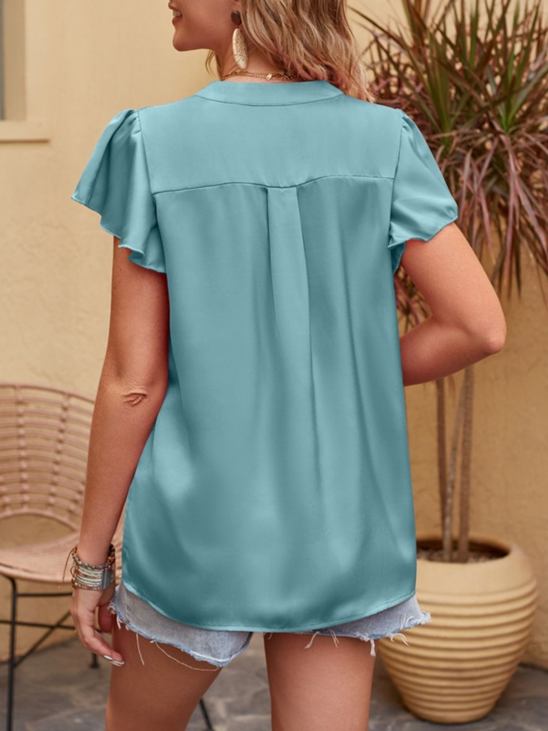 Clara® | Notched short sleeve blouse