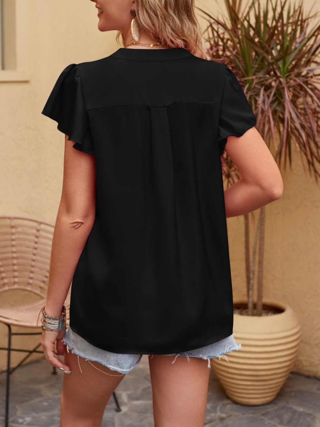 Clara® | Notched short sleeve blouse