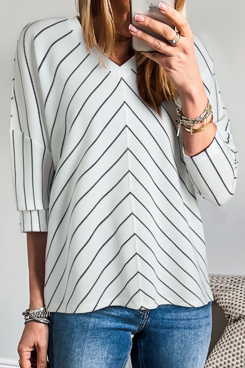 Daniela® | Striped long-sleeved blouse with a V-neck