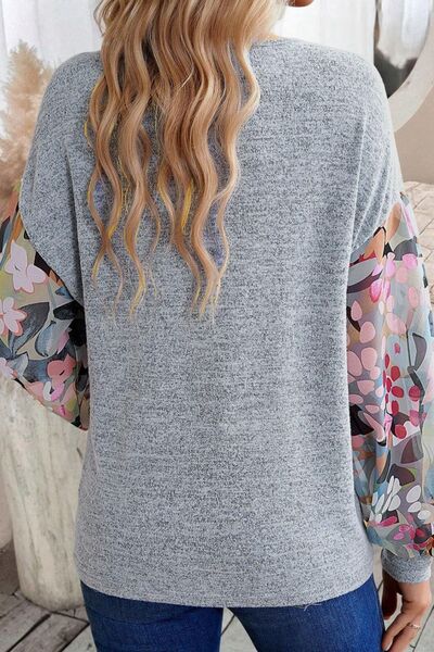 Aurora® | Printed top with a buttoned V-neckline and lantern sleeves