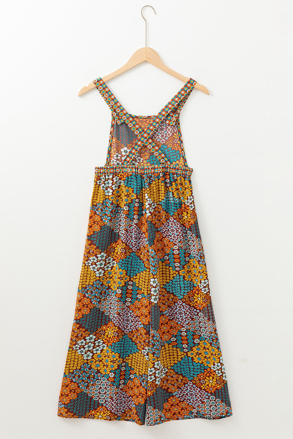 Addison® | Wide leg jumpsuit with cross straps and floral print