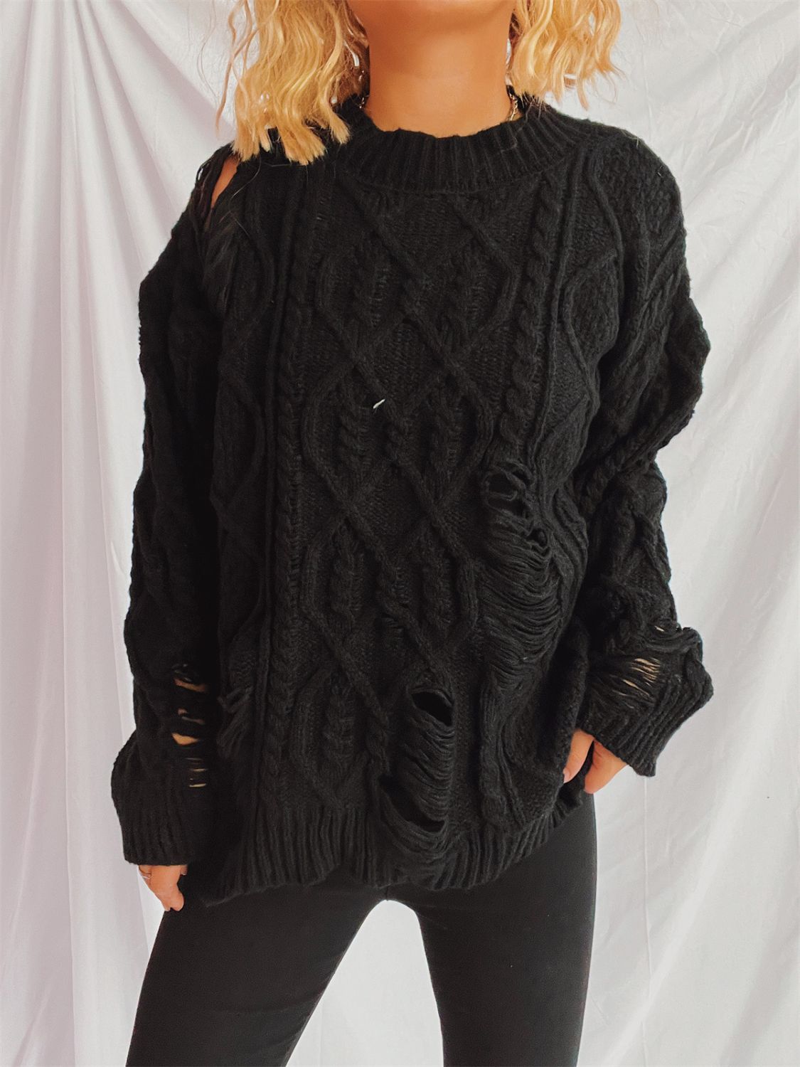 Clara® | Long-sleeved, crew-neck, distressed cable-knit sweater