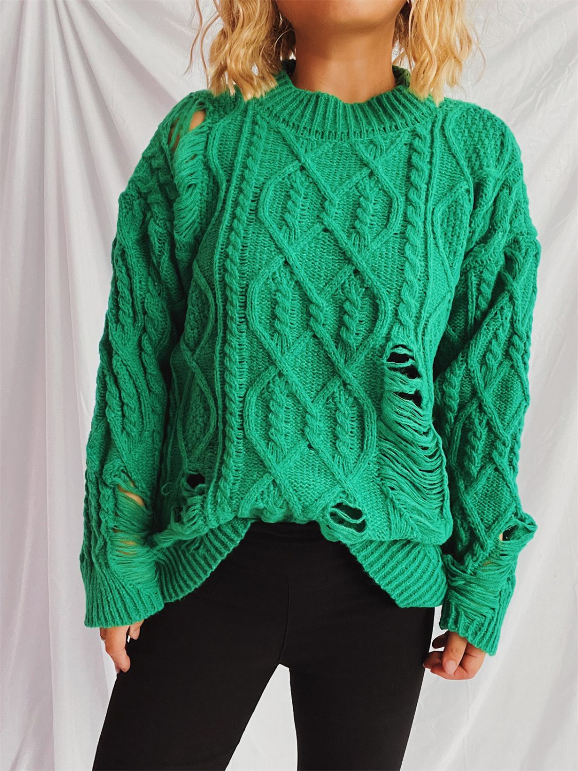 Clara® | Long-sleeved, crew-neck, distressed cable-knit sweater