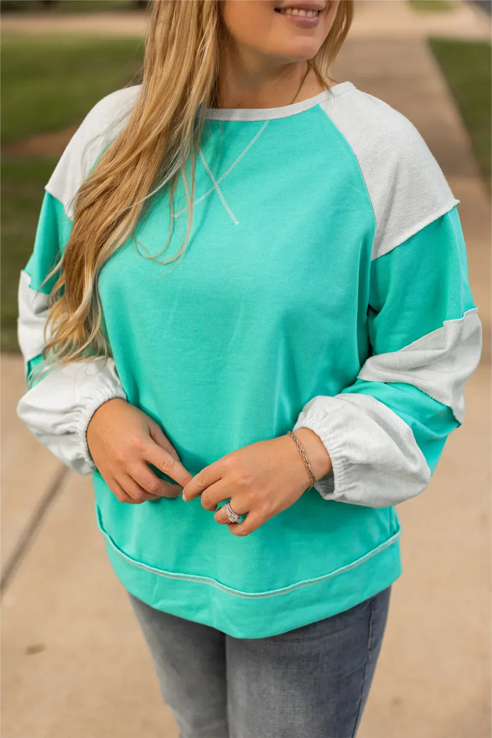 Elena® | Plus size color block long sleeve sweatshirt with exposed seams