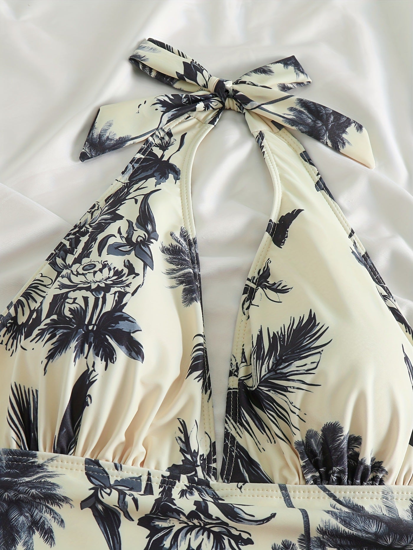 Elara® | Shaping V-neck swimsuit with garden print