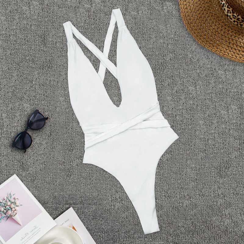 Elara® | Low-cut swimsuit with crossed straps