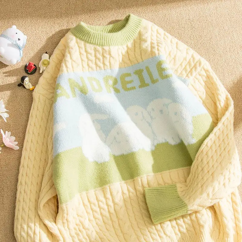 Aranza® | Cable sweater with a pastel cloud pattern