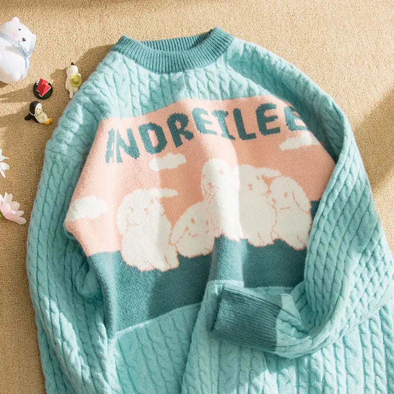 Aranza® | Cable sweater with a pastel cloud pattern