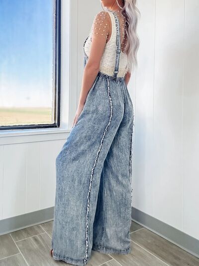 Carina® | Wide leg denim jumpsuit with exposed seams