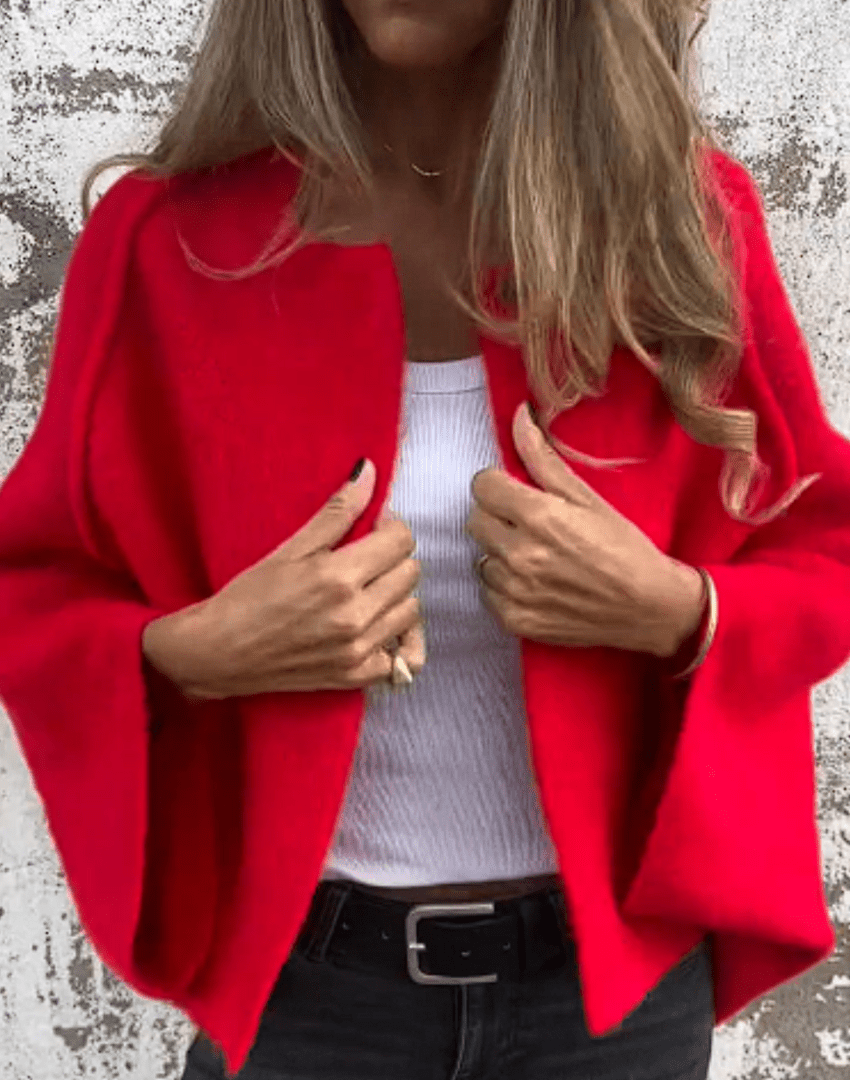 Daniela | Neutral knitted top with elegant drape design