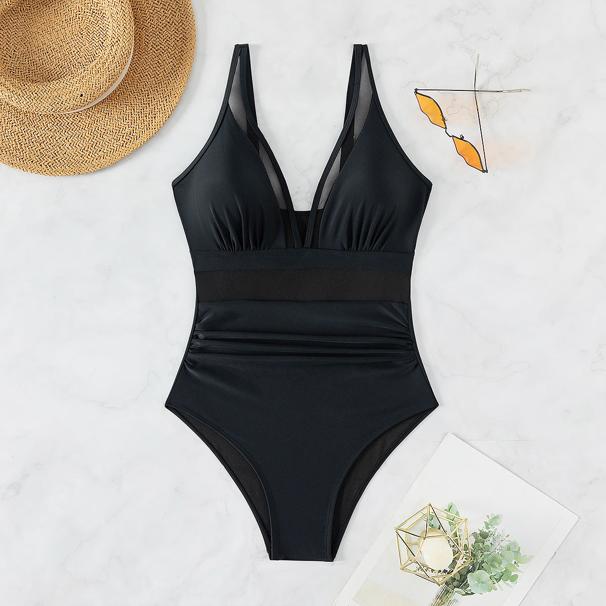 Calypso® | V-neck swimsuit with adjustable straps and sheer details