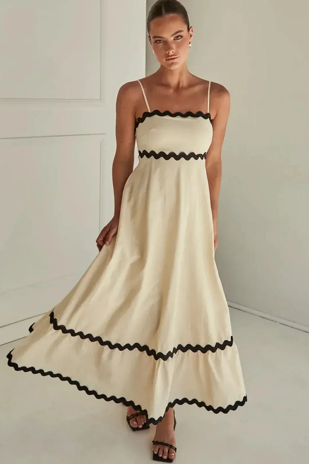 Clara® | In contrast, a long Capri dress