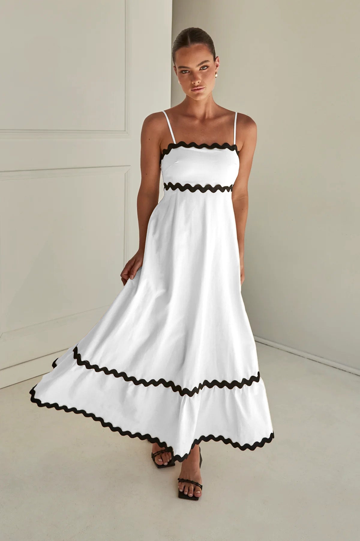 Clara® | In contrast, a long Capri dress