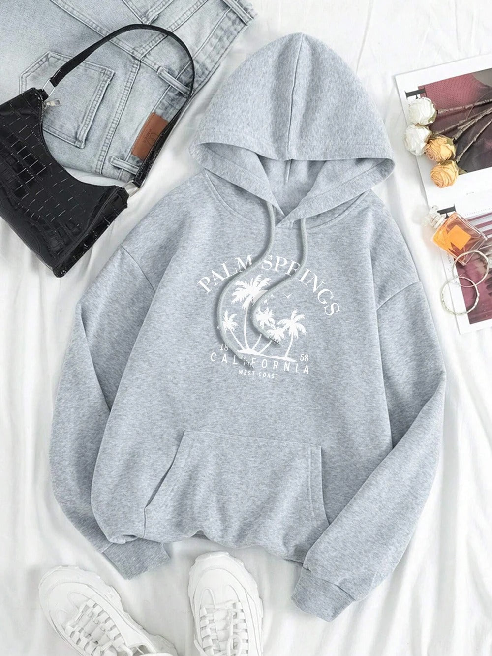 Carla® | Oversized hooded sweatshirt with smile print