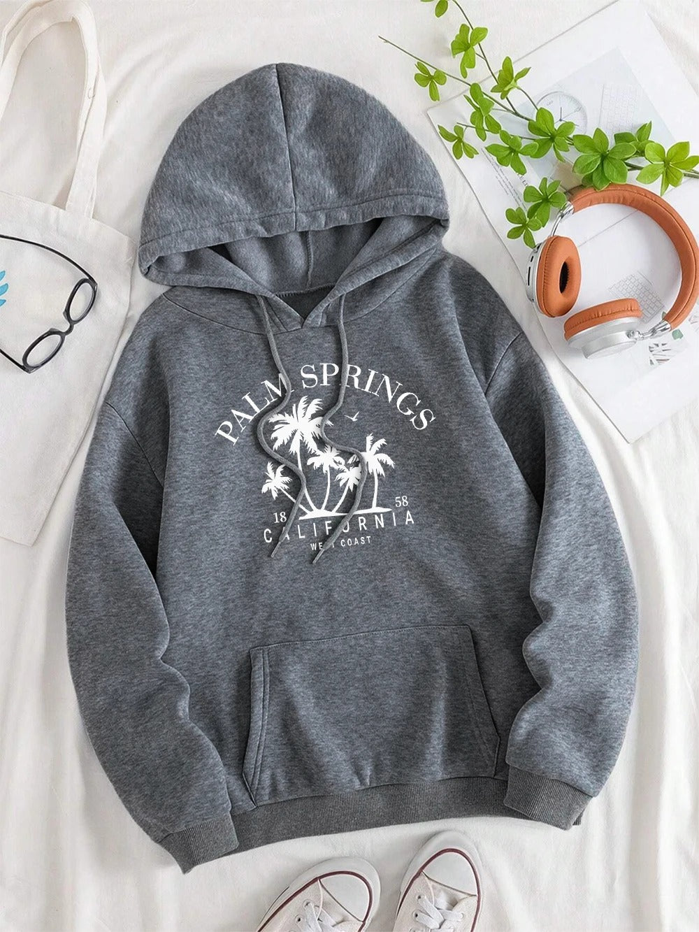Carla® | Oversized hooded sweatshirt with smile print