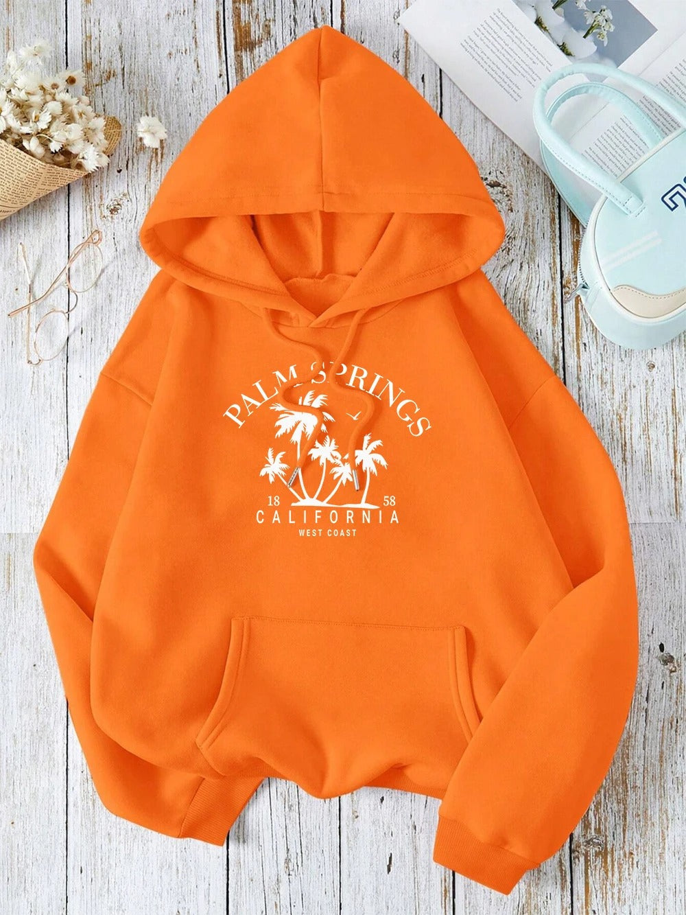 Carla® | Oversized hooded sweatshirt with smile print