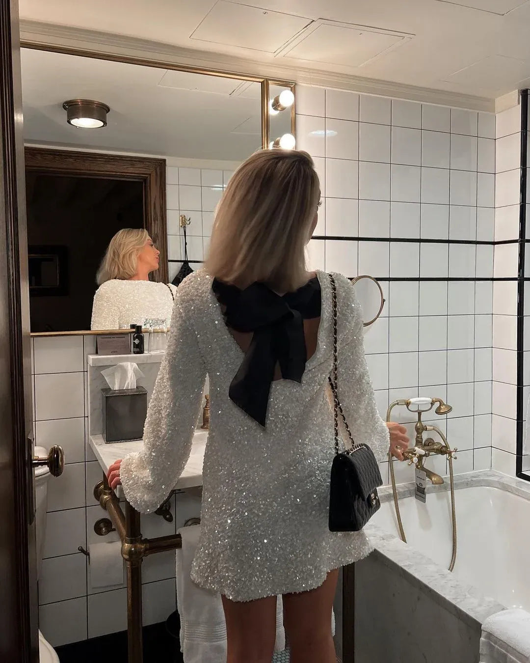 Claire® | Mini dress with contrasting bow and luxurious texture