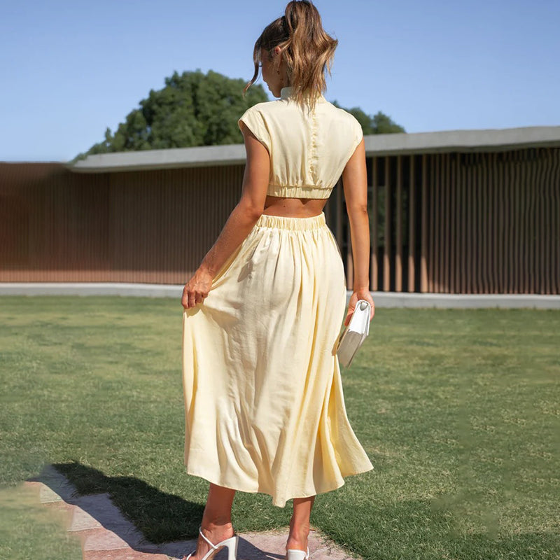 Claudia® | Pleated Dress With High Neck