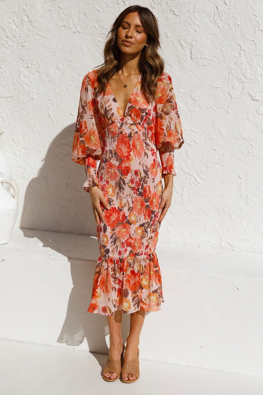 Cassia® | Orange long-sleeved dress with elegant print and V-neck