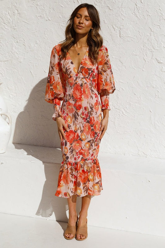 Cassia® | Orange long-sleeved dress with elegant print and V-neck