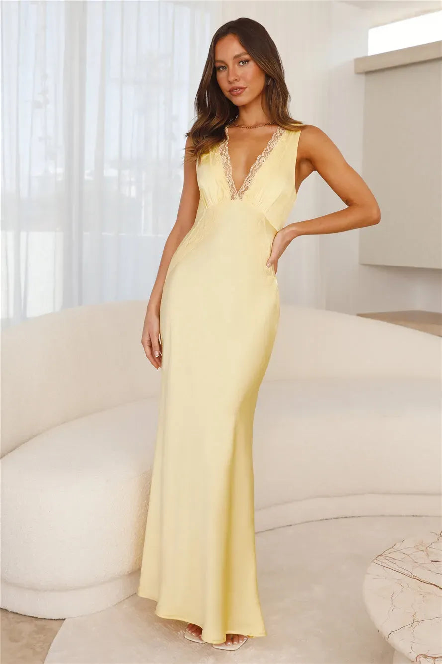 Aisling® | Long satin dress with a deep V-neck in yellow