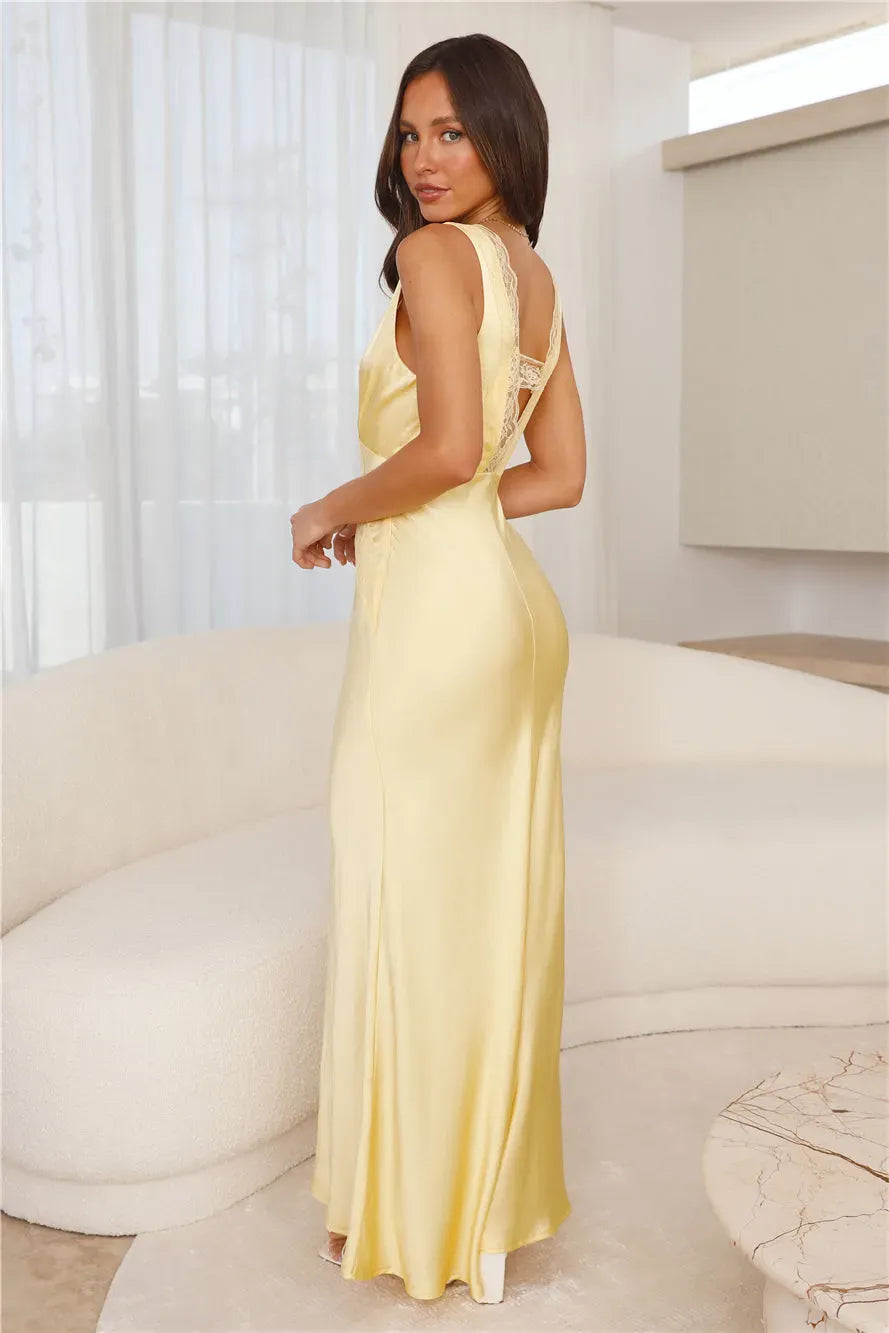 Aisling® | Long satin dress with a deep V-neck in yellow